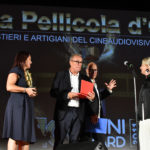 Nicoletta Ercole costumista premia il truccatore Luigi Rocchetti per la fictionIL NOME DELLA ROSA
